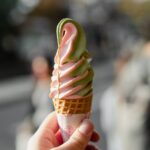 hand with ice cream cone
